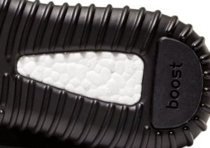 On the bottom of the Boost, there's a white exposed part that has flower-like embossing