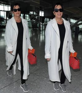 Kris Jenner wearing Yeezy Boost 350 sneakers at Heathrow Airport in London on July 14, 2015